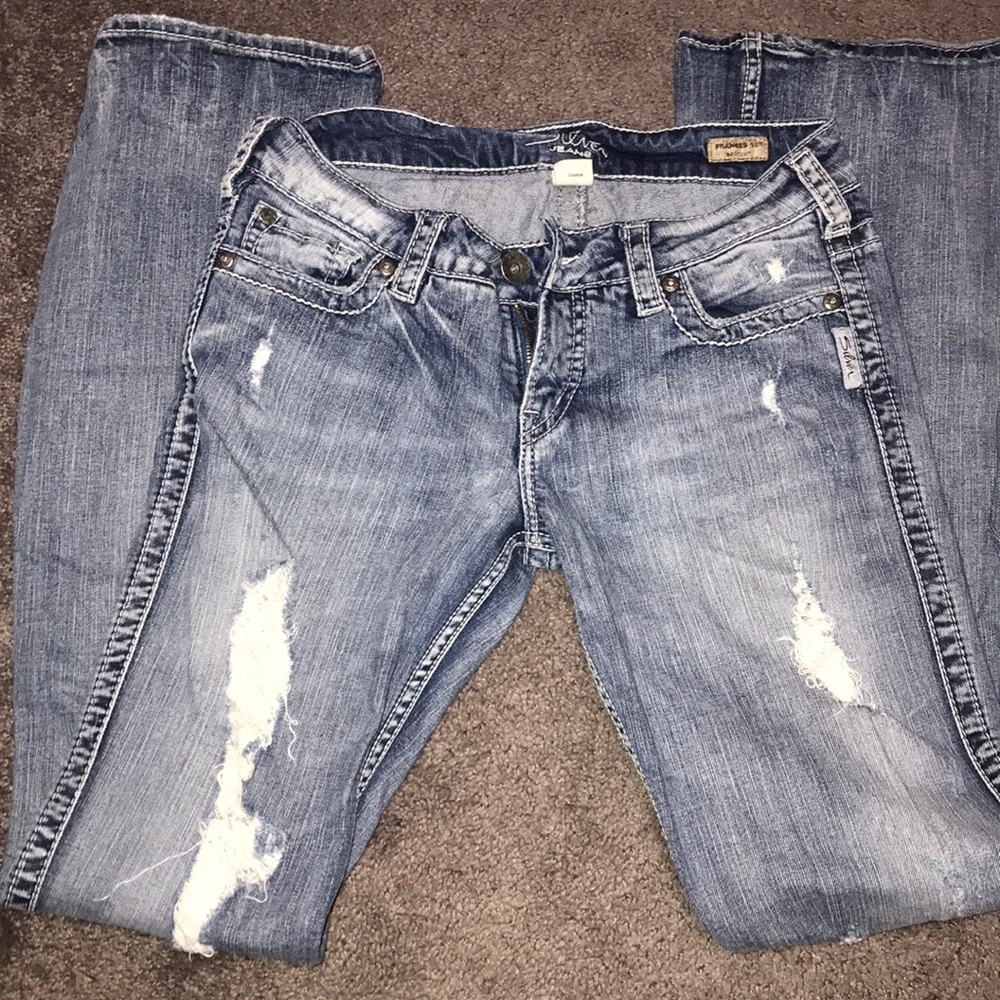 Ripped front silver jeans